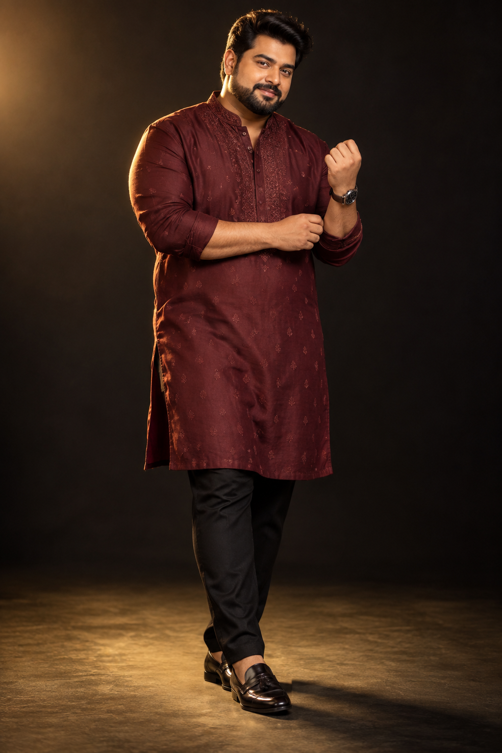 Plus-size male model wearing a burgundy embroidered kurta